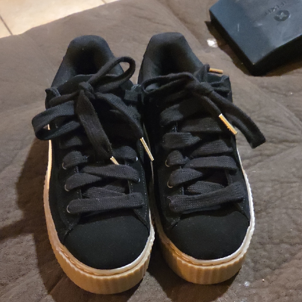 Fenty Puma Stylish Black Sneakers with Gold Accents